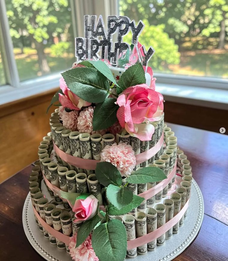 Pink rose birthday money cake